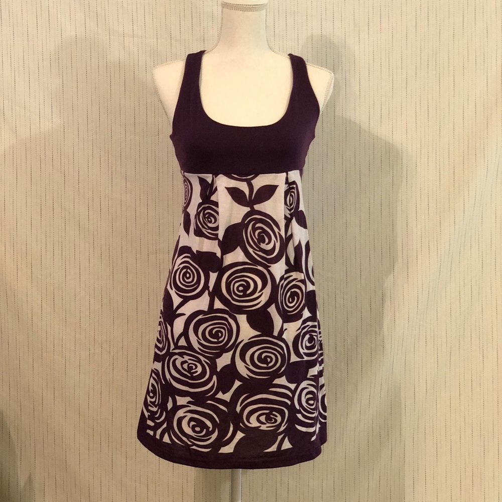Purple floral dress.